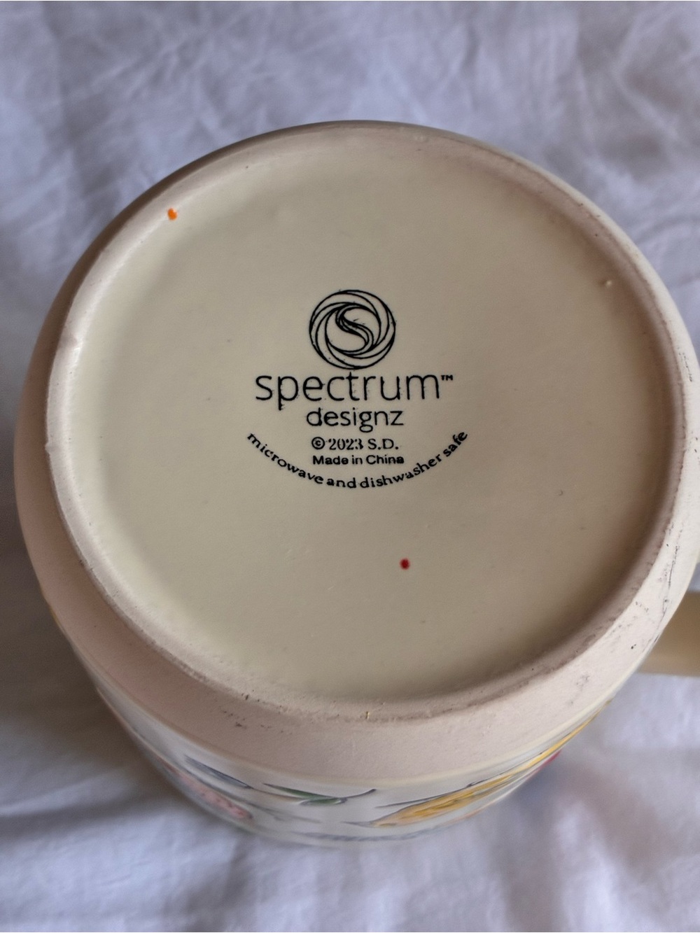 Spectrum Designz Ceramic Bird Print Mug in Cream with Orange Accents - Picture 3 of 4